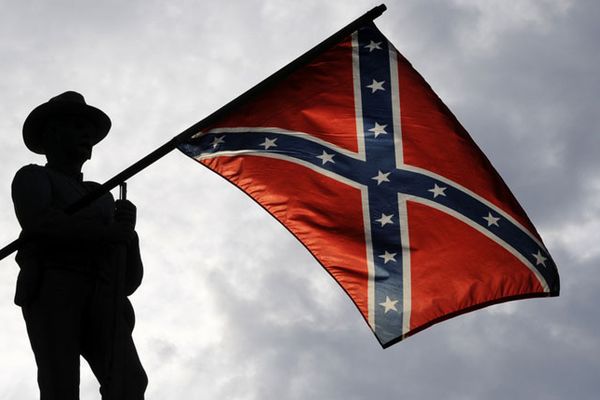 Lawmaker sets Confederate flag ablaze over red state's redistricting push