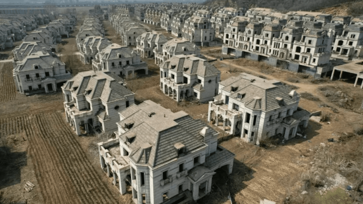 Chinese ghost town of mansions reclaimed by farmers