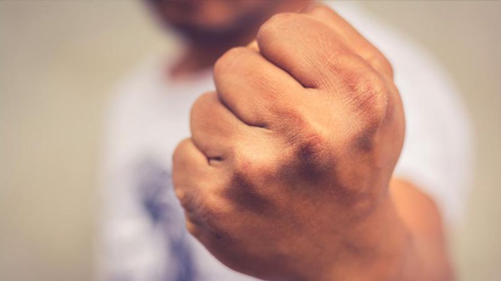 Black man seen bleeding from the face after slur-spewing mob attacks him in California: report