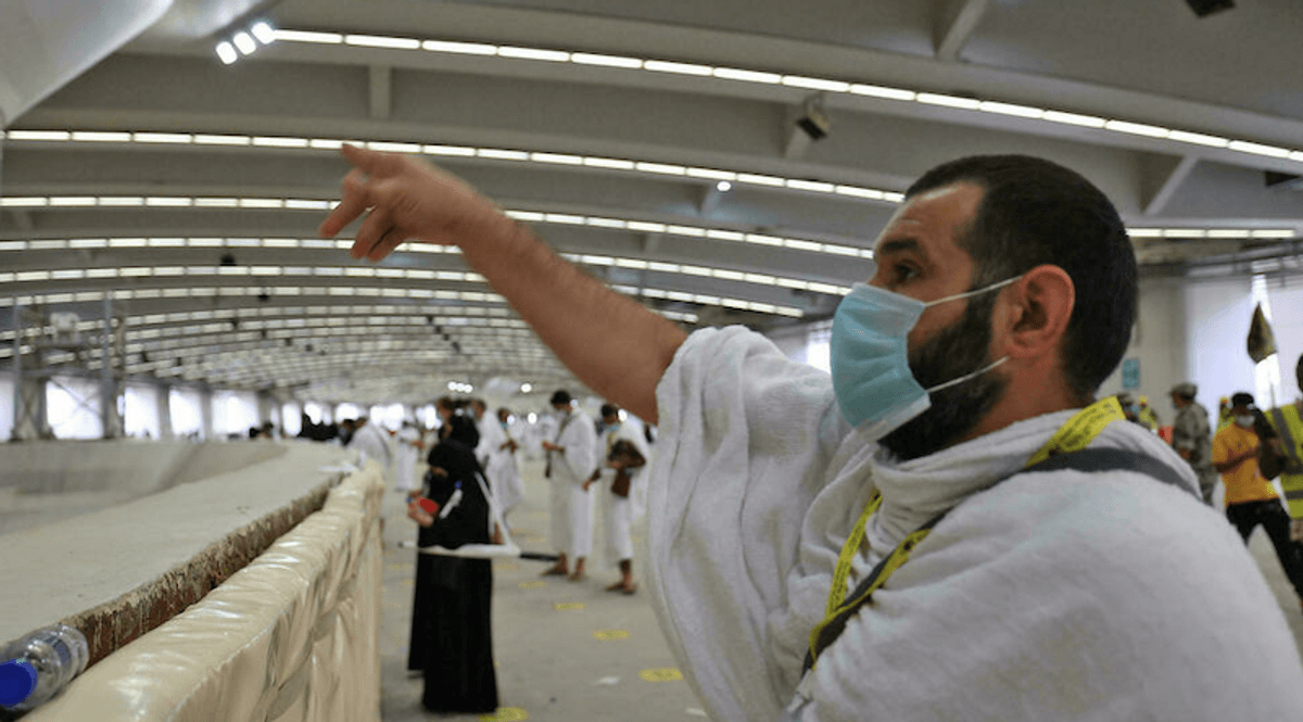 Pilgrims 'stone the devil' with sanitized pebbles in hajj ritual