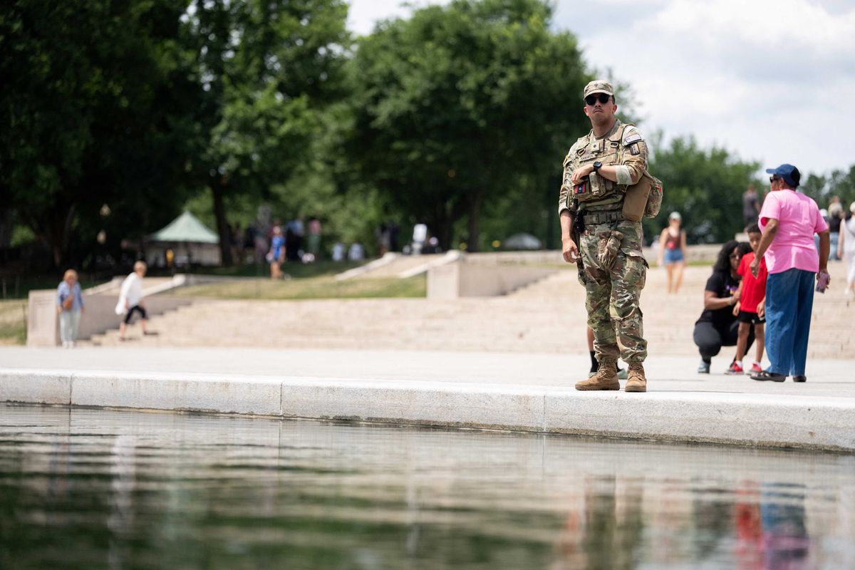 Woman swarmed by National Guard and US Marshals for dipping hand into reflecting pool: TMZ
