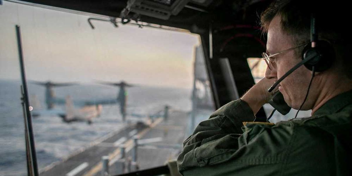 Navy searching for missing crew member after emergency landing