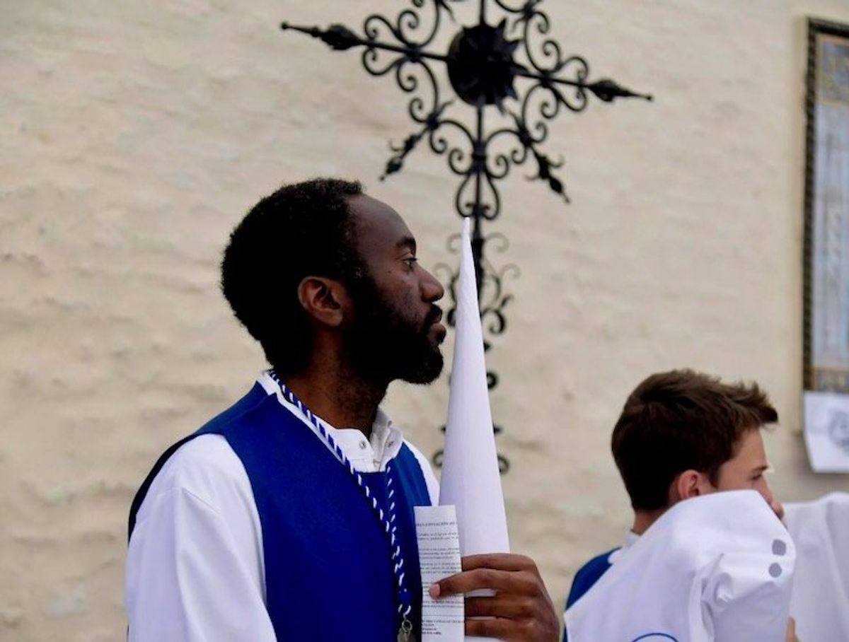 In Spain, brotherhood set up by slaves marches at Easter