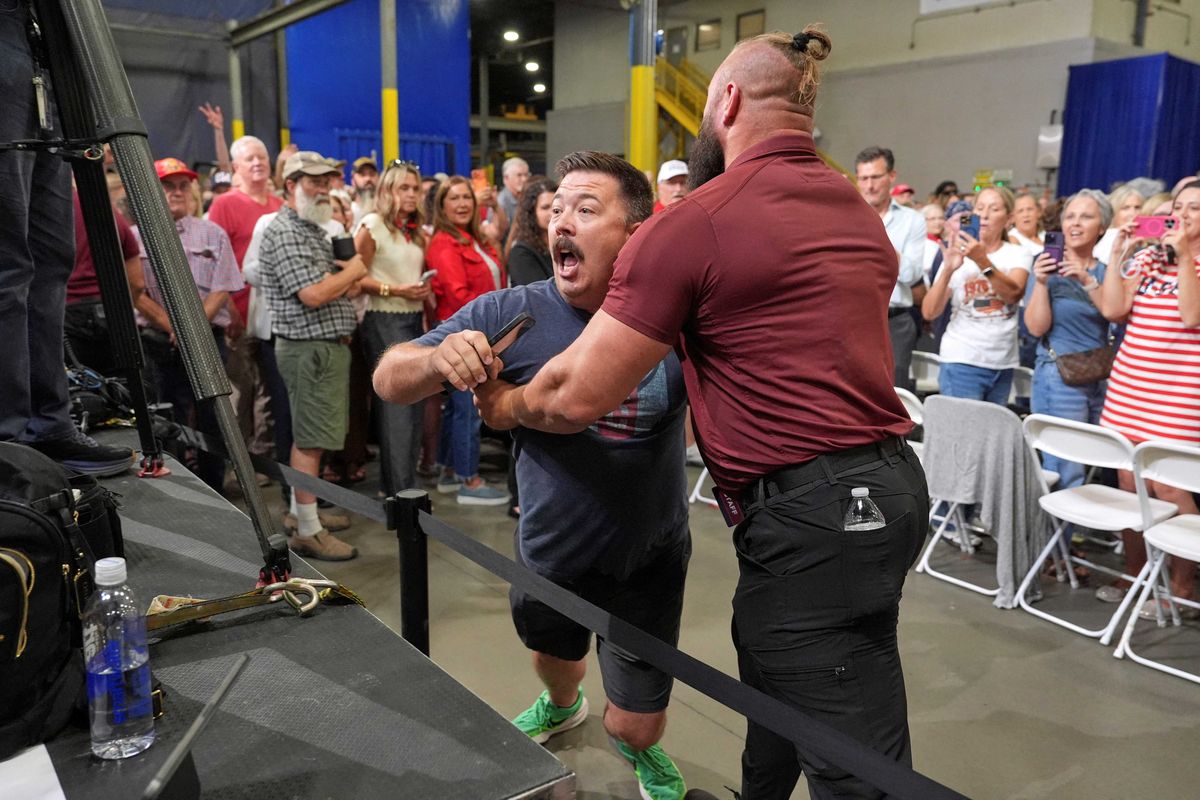 Heckler pushed out of heated Vance event as MAGA crowd breaks into chants