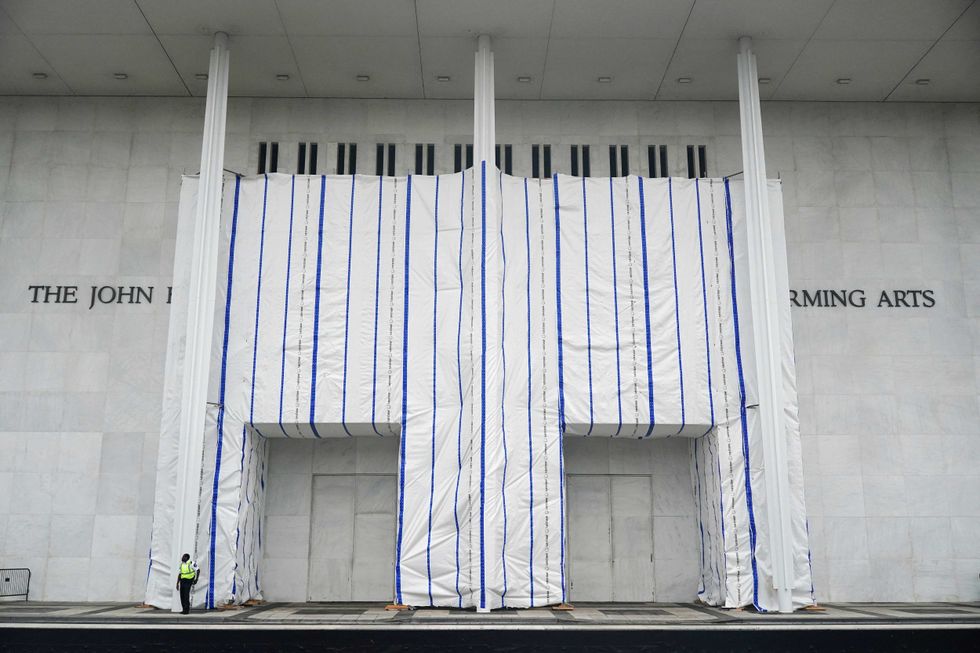 Critics ridicule Trump after tarps cover Kennedy Center facade