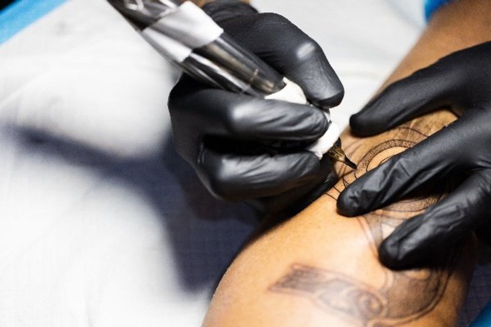 'Hell no!' Guy with Trump tattoo says he's voting Harris