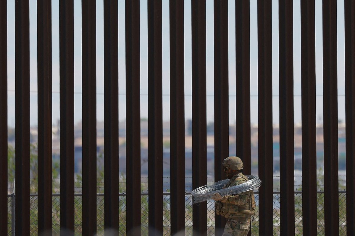 Trump orders southern border wall painted black to scorch climbers