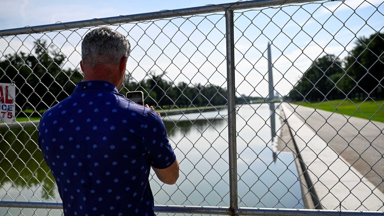 Tarps hiding drained Reflecting Pool raise suspicions about Trump's vandalism claim