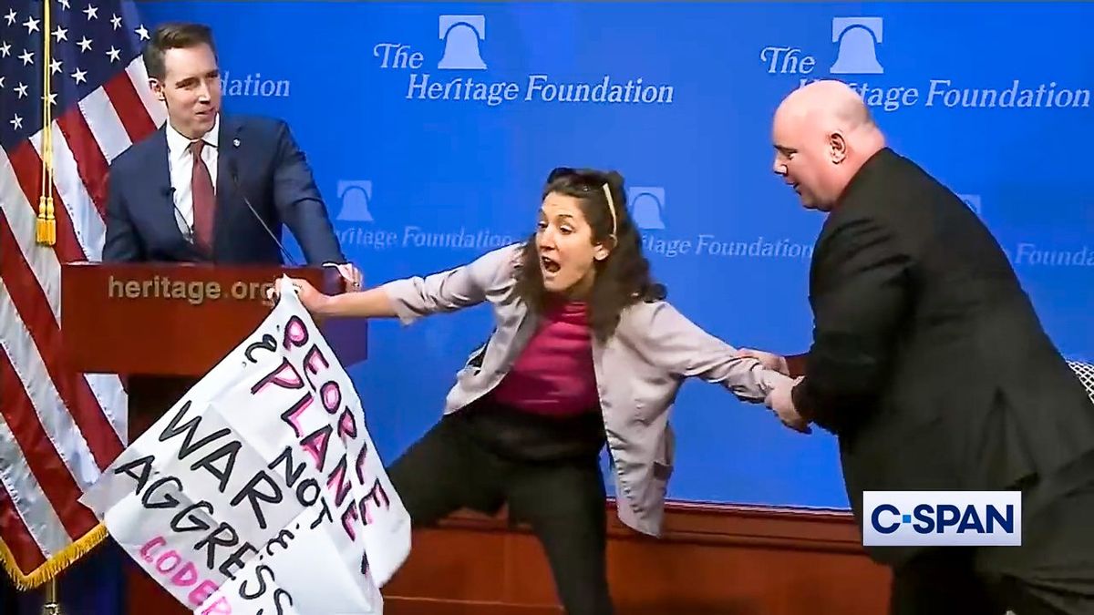 Watch: Josh Hawley heckled by climate activist as she's dragged from stage