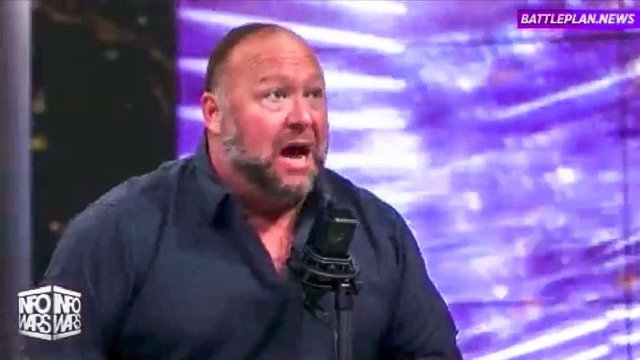 Alex Jones explodes at caller over 'damn' QAnon: 'I have to put up with the Q people all over the place!'