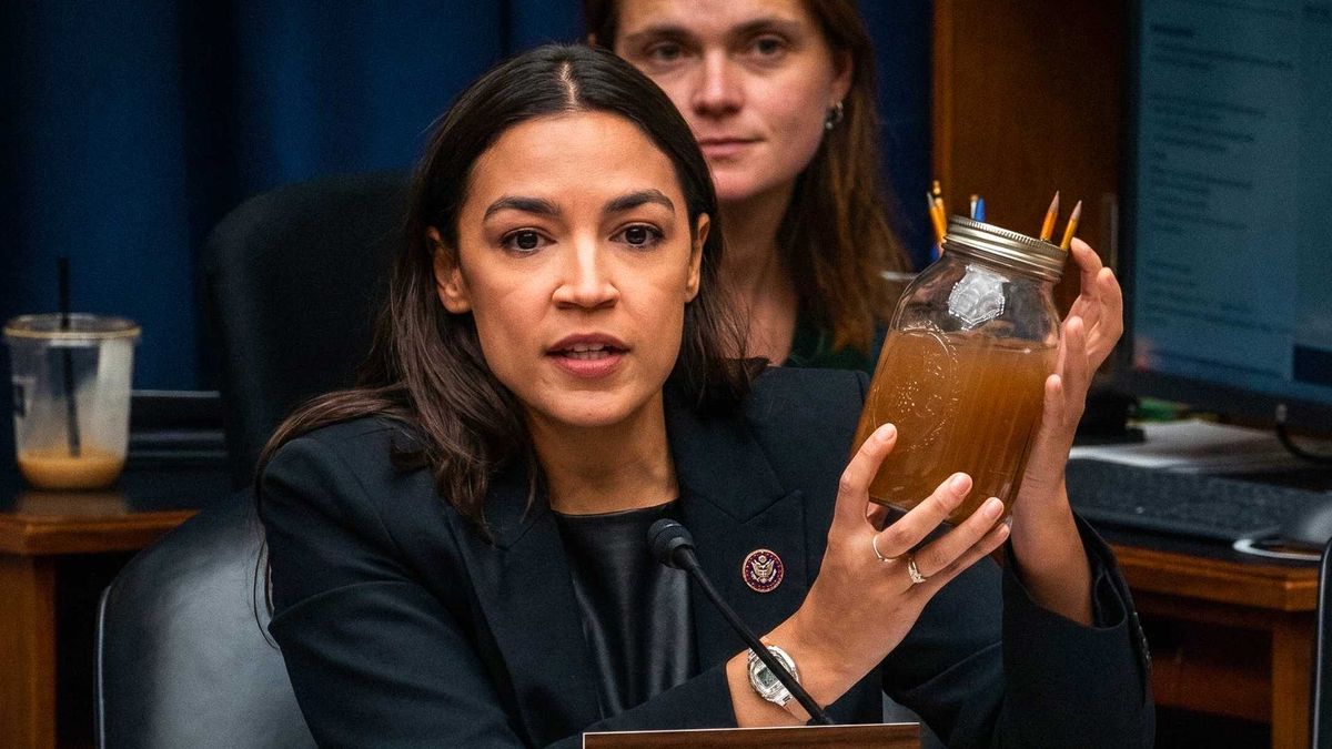AOC brandishes jars of filthy water as she shames Trump official