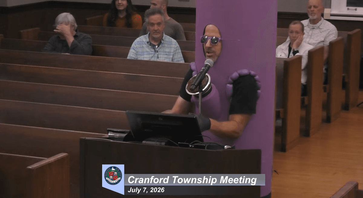 Chaos as singing protesters take over town council meeting in blue district