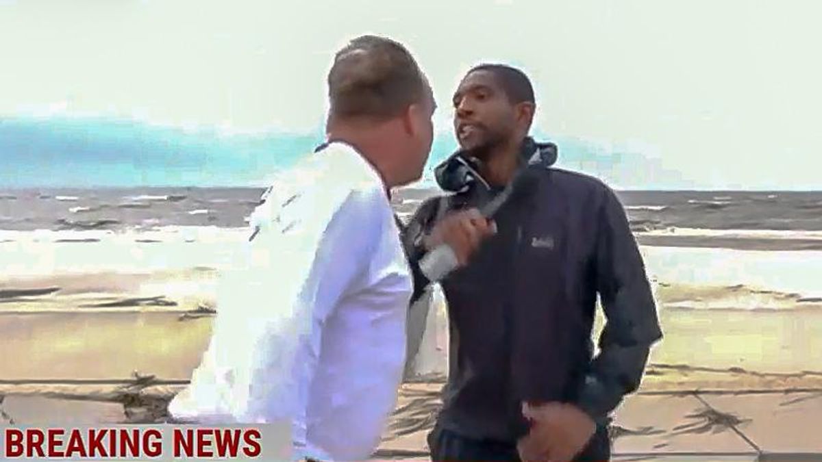 WATCH: Angry white man lunges at NBC correspondent during live hurricane report