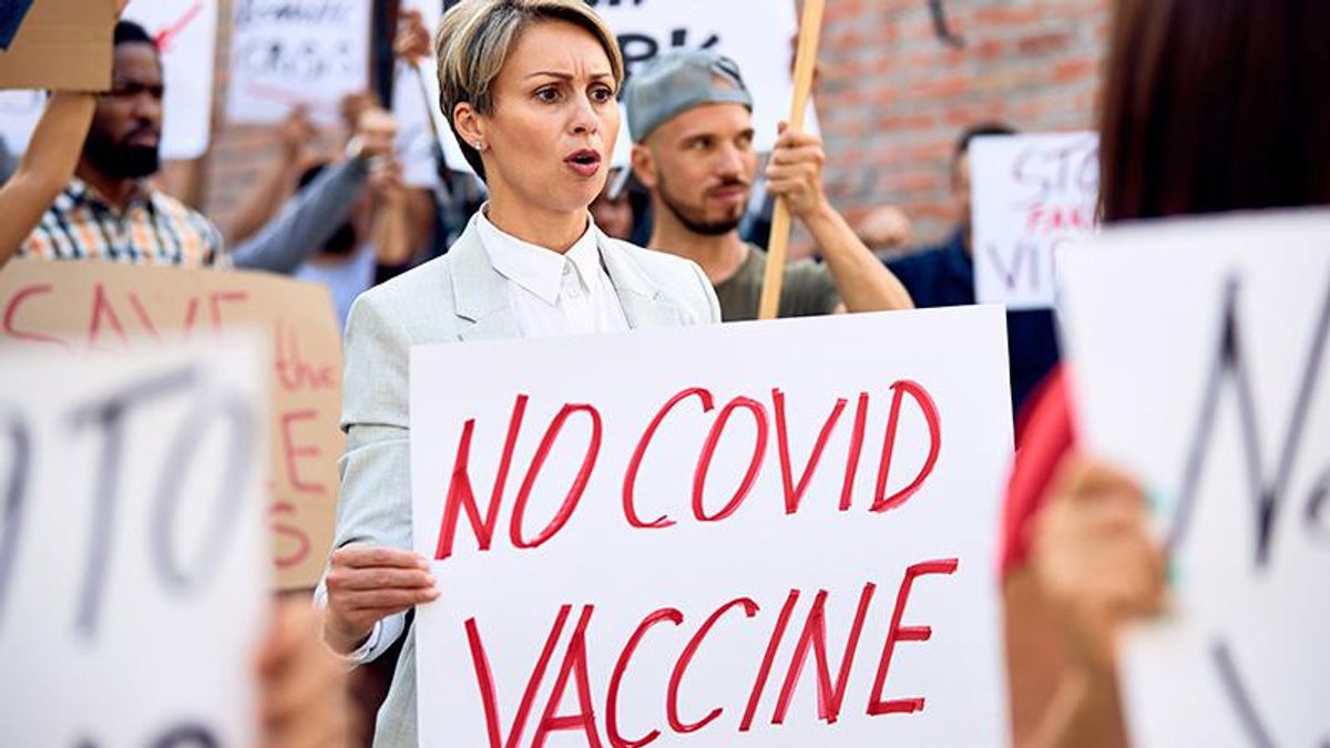 Here's the bizarre reason why white supremacists don't think they need to get vaccinated: extremism expert