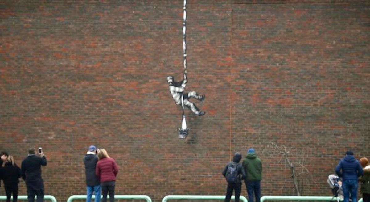 Banksy takes credit for work at Oscar Wilde jail