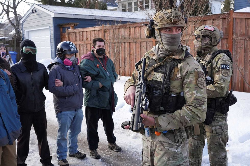 'Hallmarks of an occupation': Chaos as masked ICE agents terrorize neighborhoods