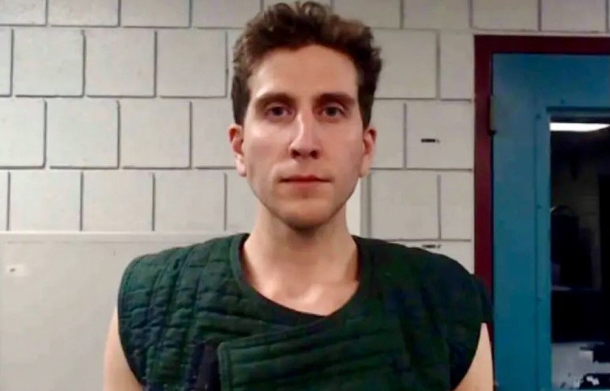 US university killings suspect stays silent at arraignment