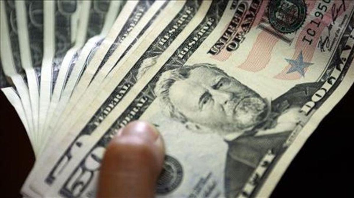 Cash truck spill prompts California freeway frenzy