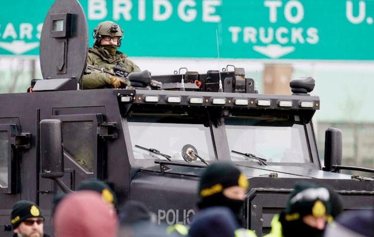 Police positioned to clear key border bridge of protesters in Canada
