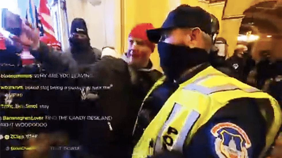 Capitol Police member caught on camera taking selfies with insurrectionists