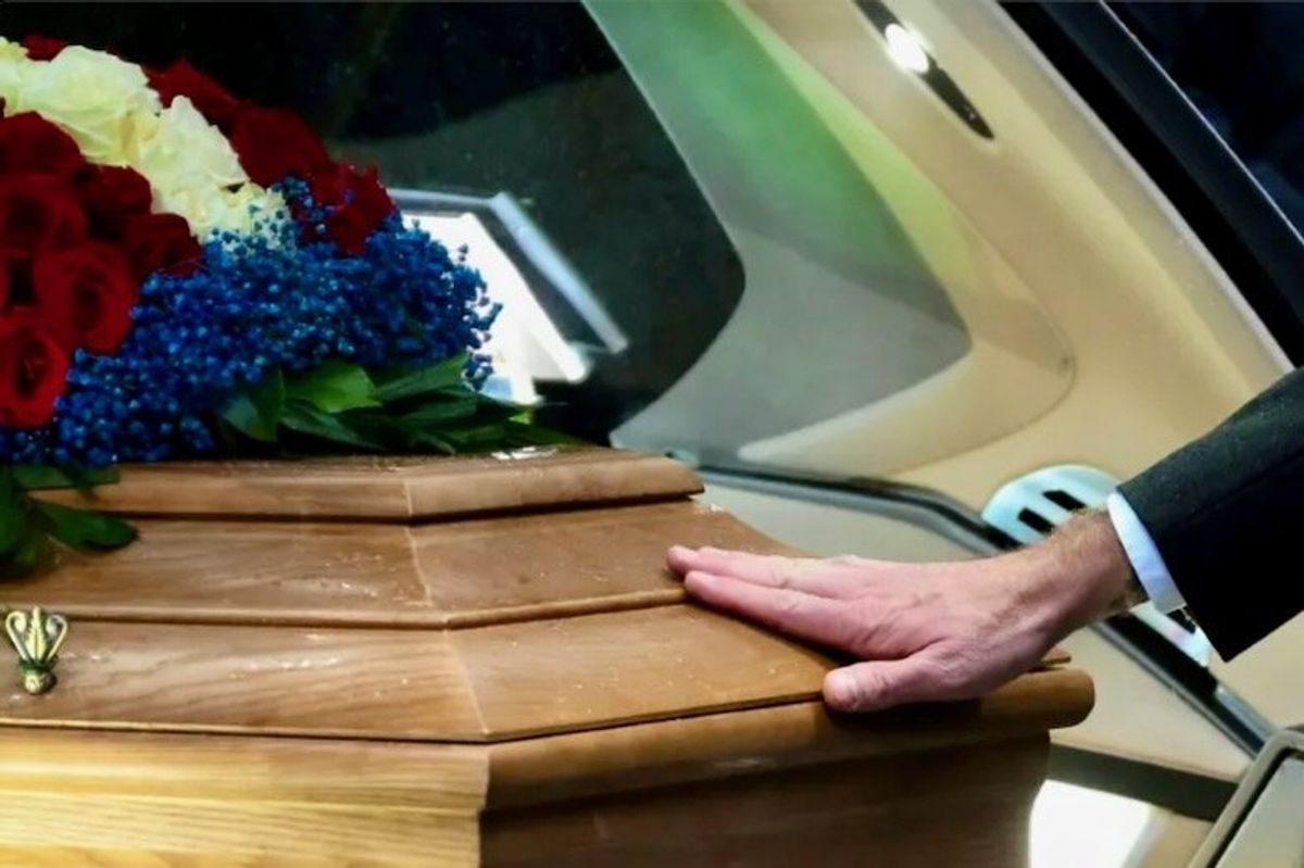 U.S. funeral director wanted after body of long-dead woman found at house