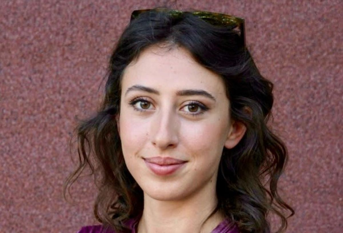 Italian reporter jailed in Tehran returns to Italy