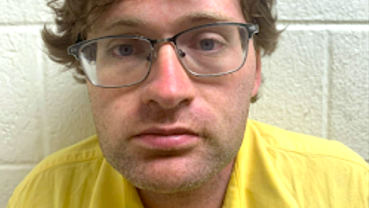 Vandal who painted 'groomer' on libraries had disturbing evidence of child sex abuse in apartment: police