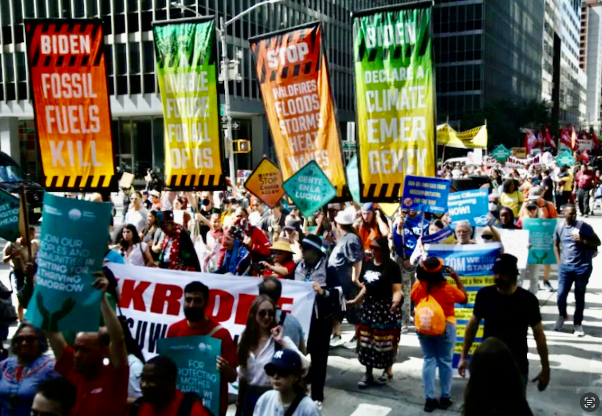 Climate protesters throng New York, demand end to fossil fuels