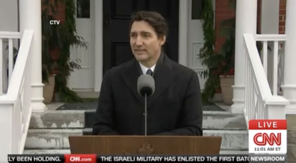 Tearful Canadian PM Justin Trudeau announces resignation