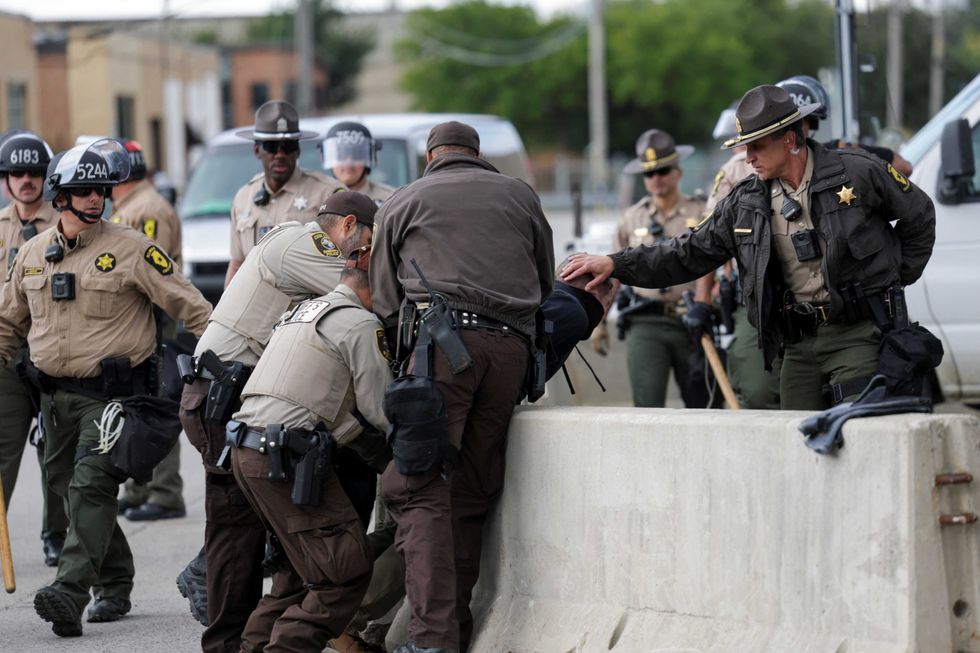 Conservative sounds alarm on under-the-radar Trump move to pay off cops to assist ICE