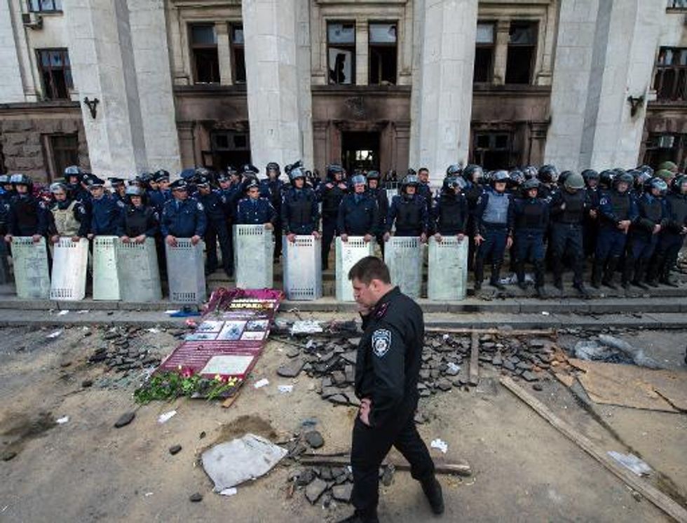 PM claims Russia trying 'to destroy Ukraine' as pro-Russian protestors assault Ukranian police headquarters