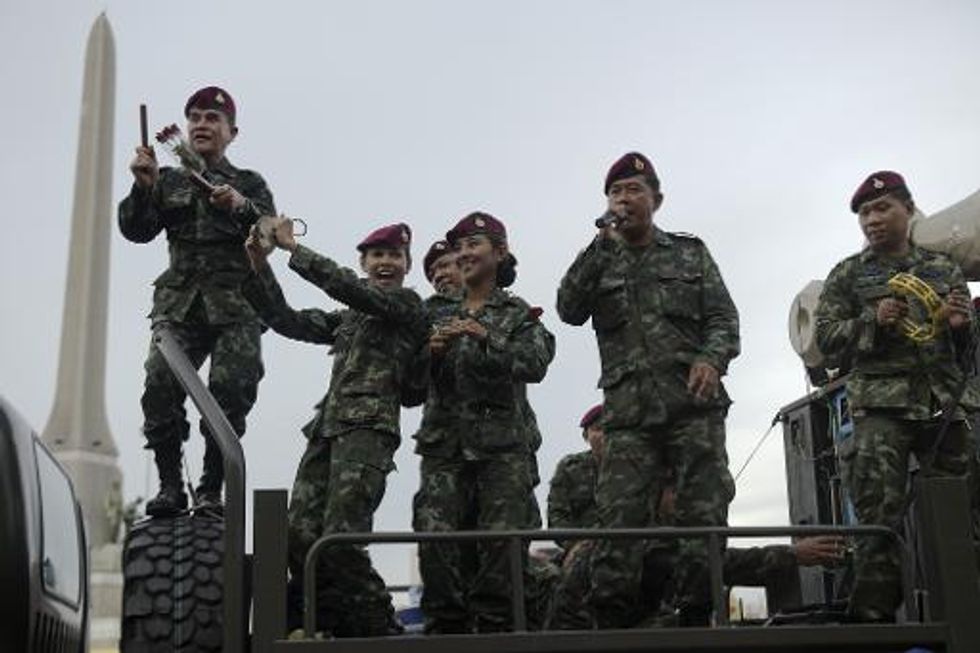 Thai police arrest anti-coup flash mobs using 'Hunger Games' salute
