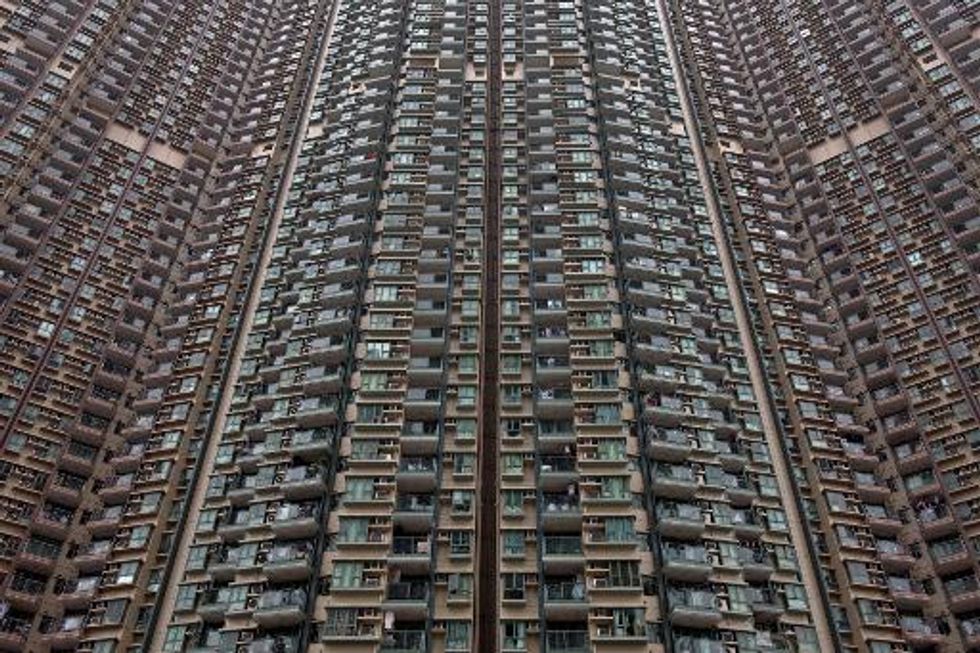 Unemployed murder suspect found dead in Hong Kong apartment after shoot-out with police