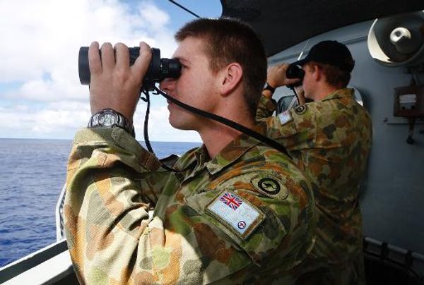 Malaysian authorities insist that no calls were made from cockpit of Flight MH370
