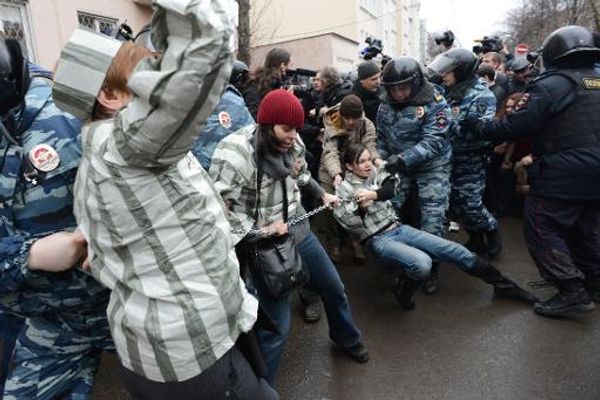 Russia sentences seven anti-Putin activists to prison, detains 200 protesters