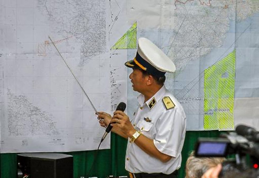 Malaysia rejects jet 'debris' images and 4-hour flight report