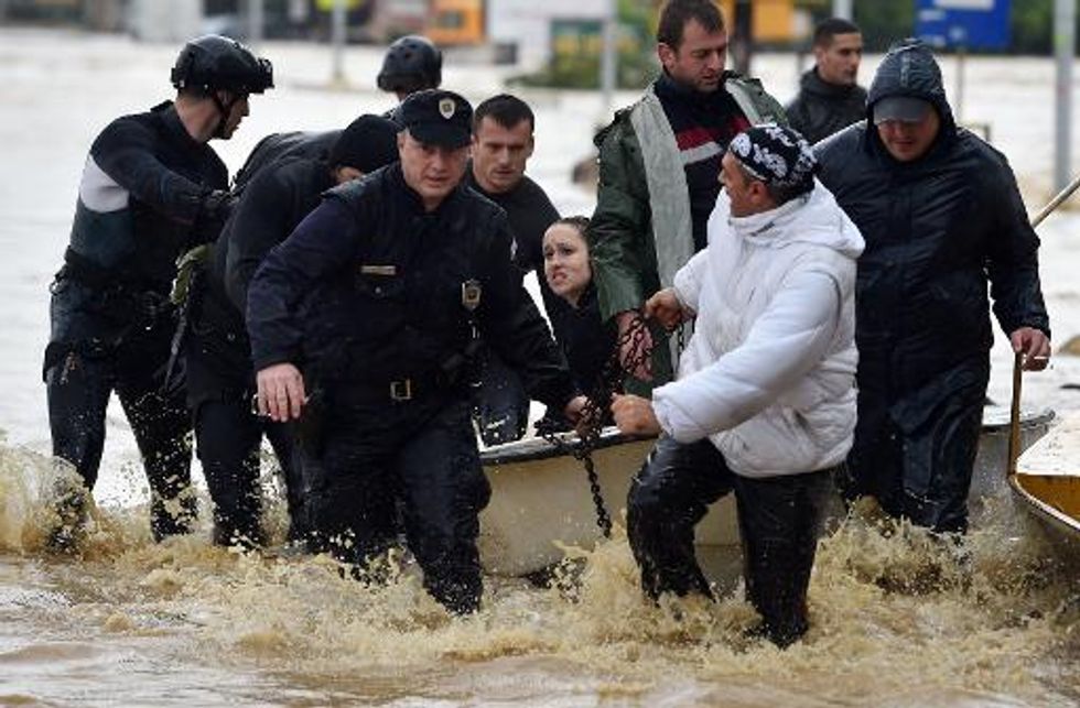 Flooding in Bosnia and Serbia kills at least 14