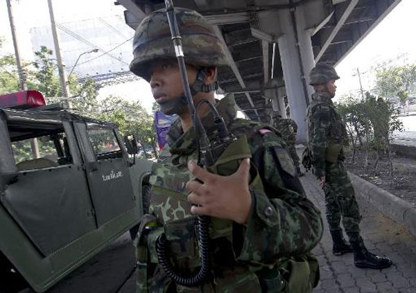 Thai pro-government leader shot, protesters vow to fight on despite state of emergency