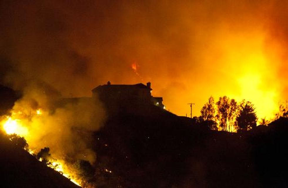 Wildfires rage across San Diego County