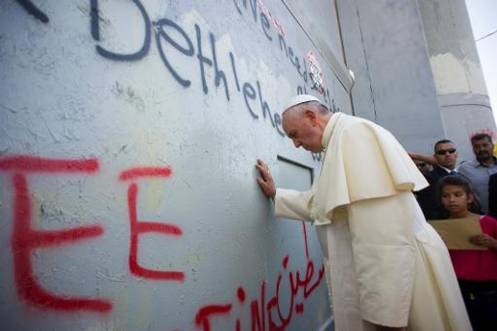 Pope Francis makes surprise visit to Israel attack victims memorial