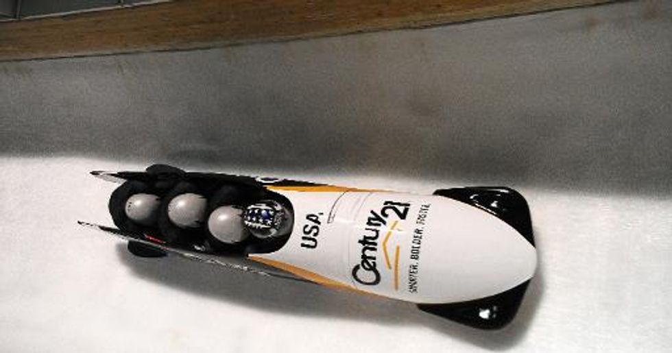 American bobsled star Johnny Quinn 'smashes door' to escape Sochi shower