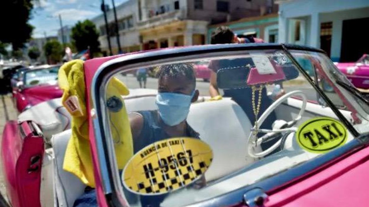 Squeezed by sanctions, pandemic, Cuba finally opens up economy