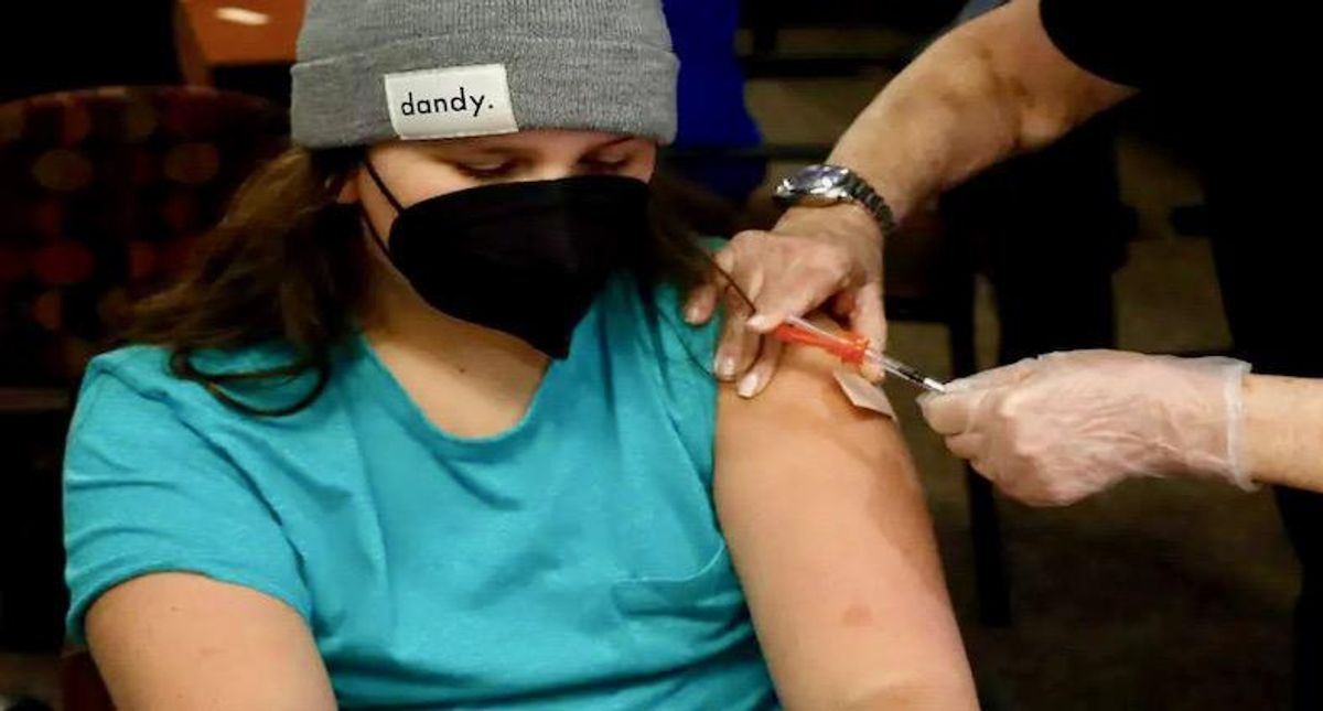 Donuts and hangouts: US kicks off Covid vaccination for teens