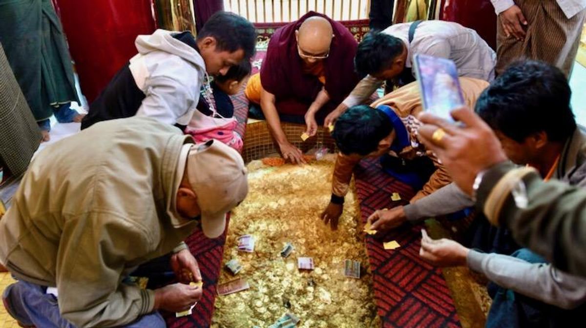 Myanmar pilgrims return to Buddha's golden footprints