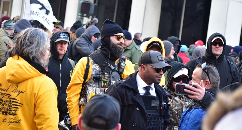 A far-right group with a history of violence plans to join a QAnon-inspired march in North Carolina
