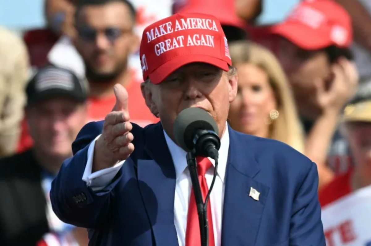 'Protector?': Outrage as Trump 'endorses a woman getting hit' after she disrupts his rally