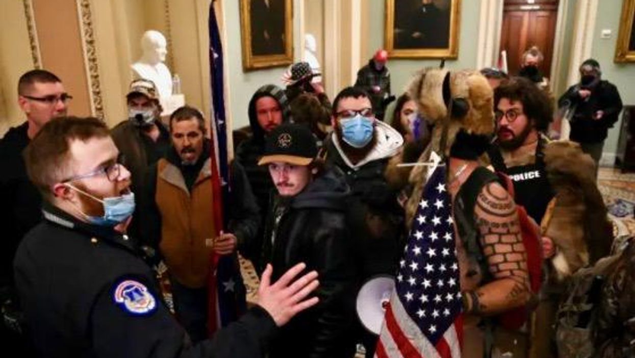 Far-right extremists call for the execution of 'coward' Trump after he asks for calm following riot: report