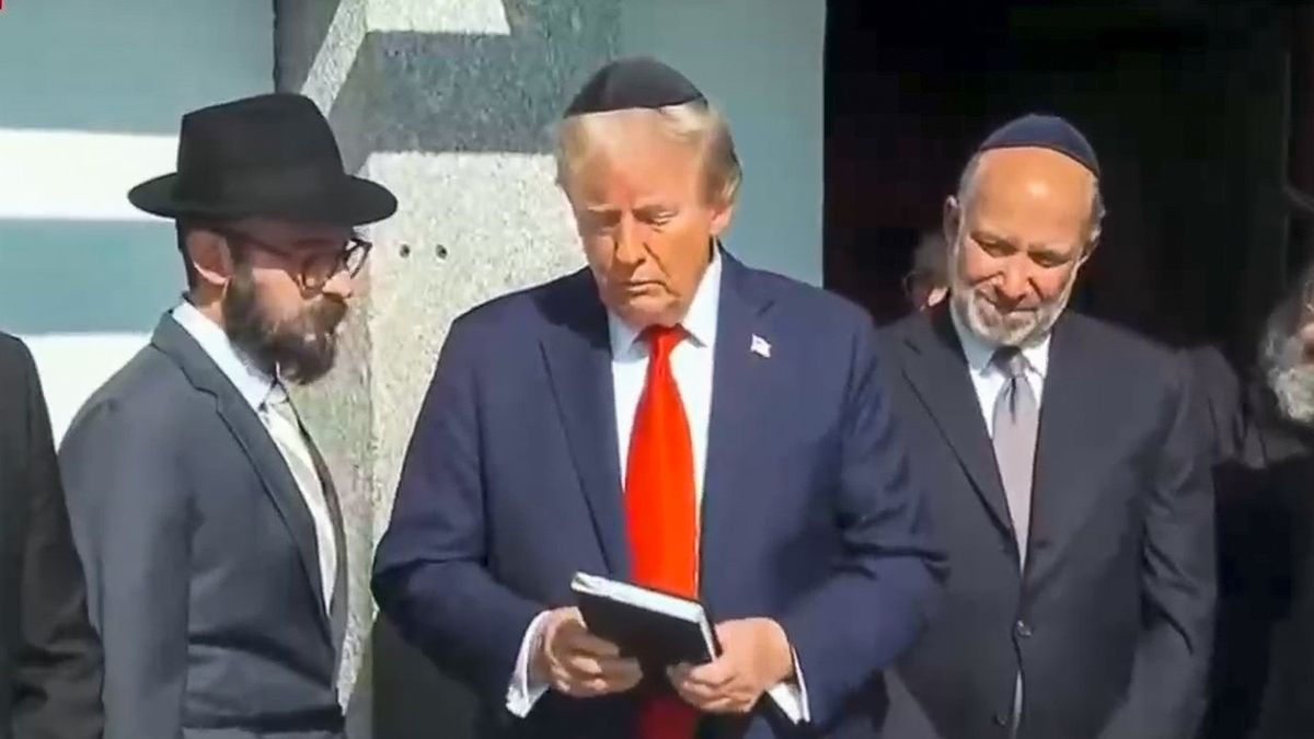 Trump offers souvenir signature while visiting rabbi's gravesite for Oct. 7 remembrance