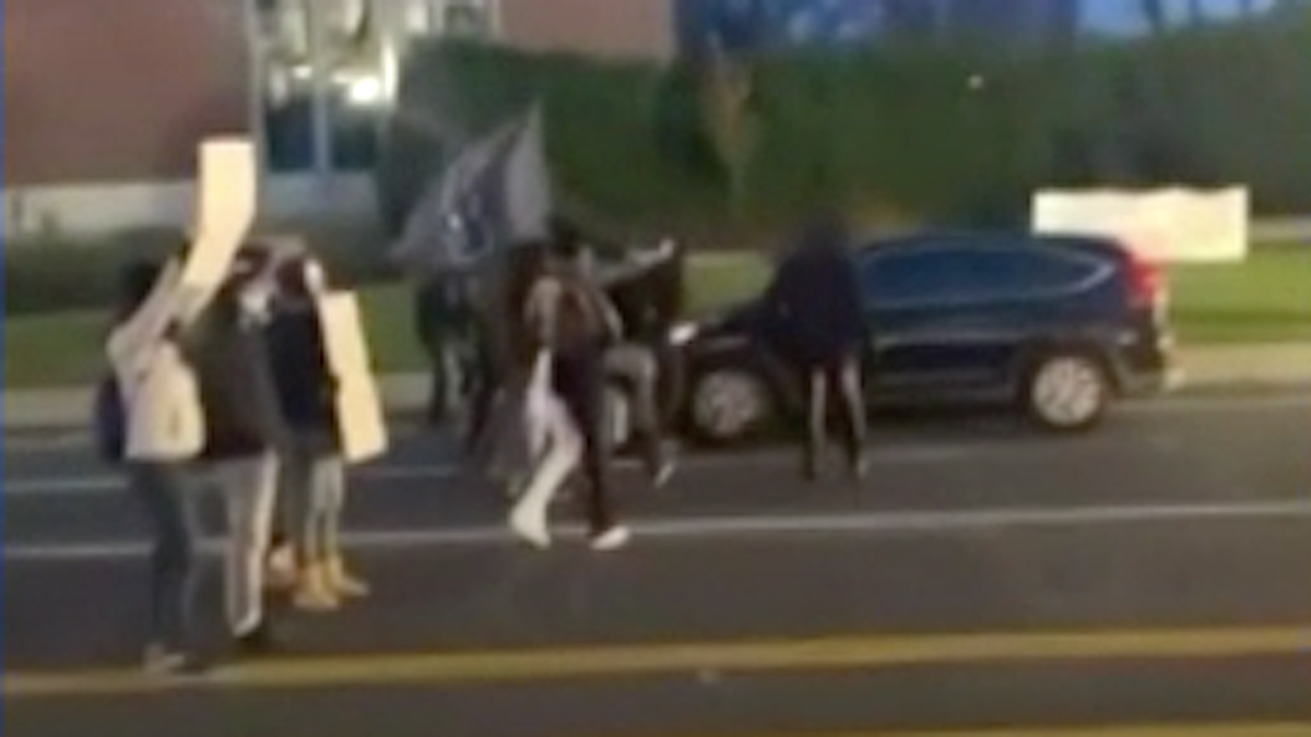 'Vigilante' driver plows into group protesting Kyle Rittenhouse acquittal