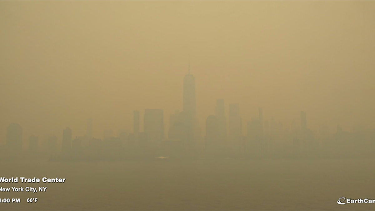 Wildfire smoke delays flights across the Northeast as FAA reports dangerous visibility